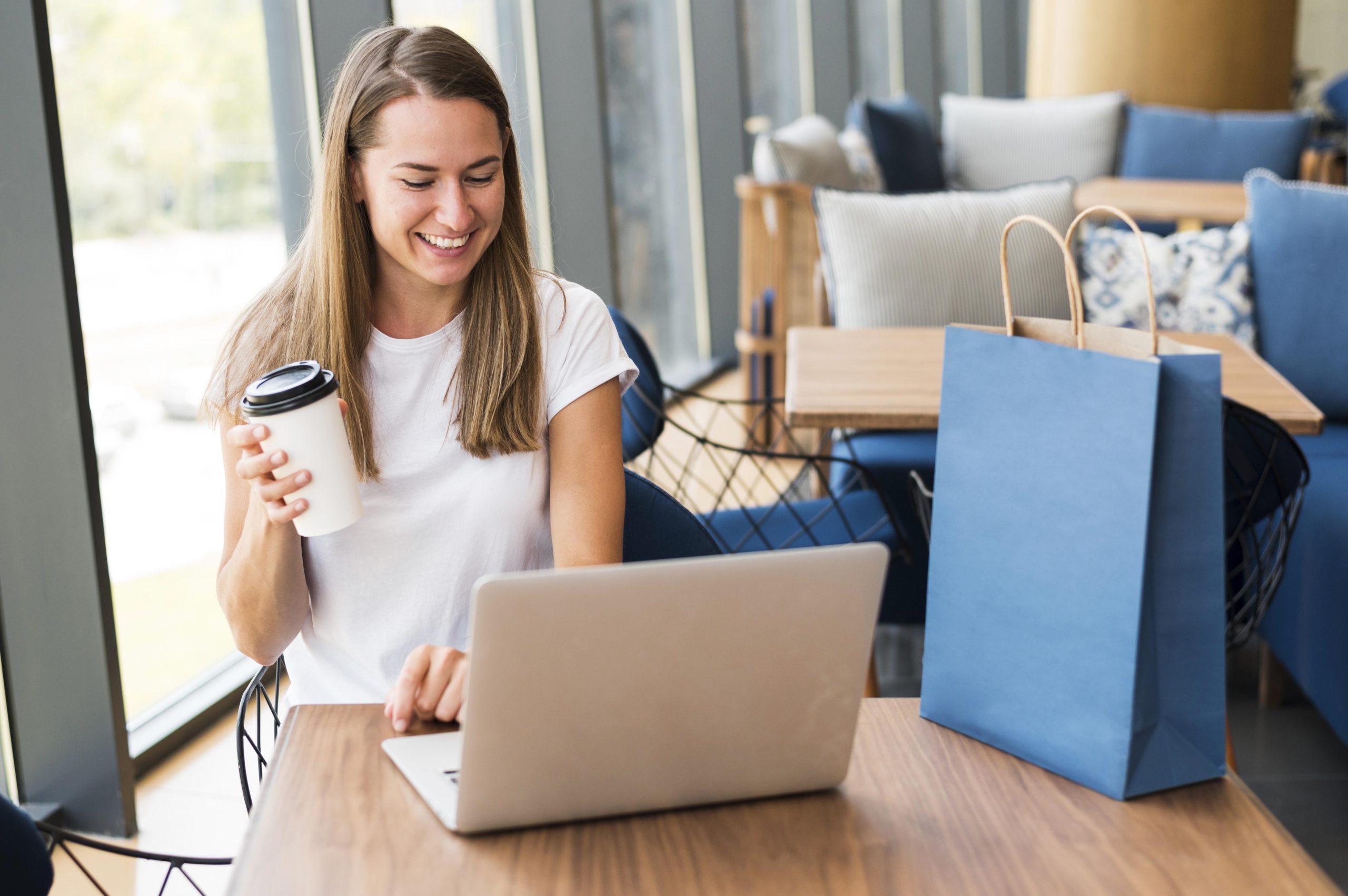 beautiful-young-woman-working-laptop